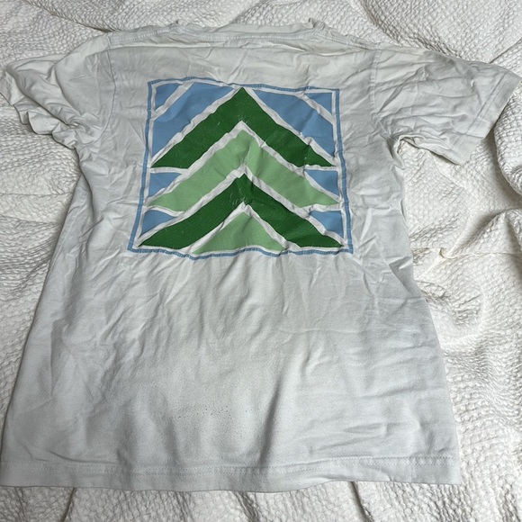 The brand is Russell and the size is small and is white with green and blue. - Picture 4 of 6